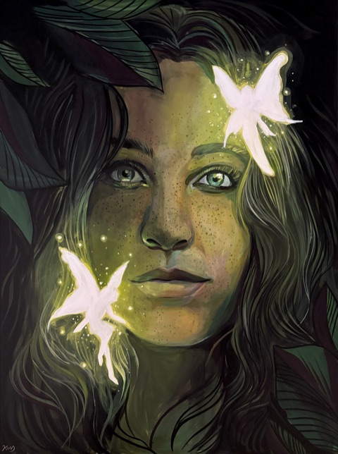 A freckled woman surrounded by glowing fairies